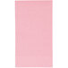 A close-up of a pink paper with a black border.