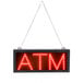 A white sign with red LED lights that says "ATM" hanging from a chain.