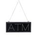 A black rectangular LED sign with white "ATM" text.