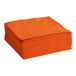 A stack of Sunkissed orange Creative Converting luncheon napkins.