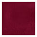 A red luncheon napkin with a square border.