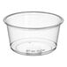 A clear round 12 oz. plastic deli container.