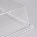 a clear glass pyramid on a white surface