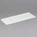 A white rectangular metal plate with holes.