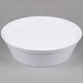 A white round melamine container with a white lid.
