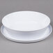 A white melamine bowl with a lid.