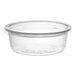 A clear round plastic deli container with a matching lid.