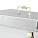 A metal screw and handle kit for a silver chafing dish.