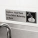 A Tablecraft stainless steel sign that says "Employee Must Wash Hands Before Returning To Work"