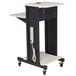 A black and white Oklahoma Sound presentation cart with a white shelf.