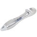 A silver ice cream scoop with a white handle.