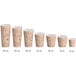 A row of Choice paper hot cups with a brown cafe design and text.