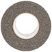 A roll of grey 3M Safety-Walk tape with a white circle.