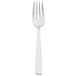 An Arcoroc stainless steel salad fork with a white handle.