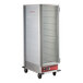 An Avantco metal cart holding cabinet with a clear glass door.