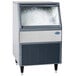 A Follett Maestro Plus undercounter ice machine with ice cubes in it.