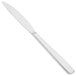 An Arcoroc stainless steel dinner knife with a white handle.