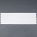 A white rectangular strip of 3M Safety-Walk Tape.