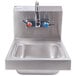 A stainless steel Advance Tabco hand sink with a splash mount faucet.