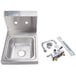 An Advance Tabco stainless steel hand sink with a splash mount faucet and drain.