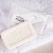 A white bar of Dial White Marble Deodorant Soap on a towel.