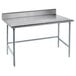 A long rectangular stainless steel Advance Tabco work table with an open base.