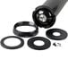 A black plastic tube with a metal ring and rubber seal holding round black objects.