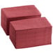 a stack of red napkins