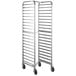 A Regency stainless steel end load sheet pan rack with wheels.