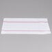 A red and white striped Snap Drape cloth napkin.