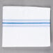 A white cloth napkin with blue stripes.