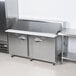 a large stainless steel commercial kitchen