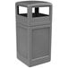 A gray rectangular Commercial Zone PolyTec waste container with a dome lid.