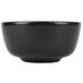 A close-up of a black Hall China bowl.