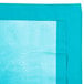 A Bermuda Blue table cover with a white border.