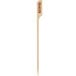 A wooden toothpick with "Gluten-Free" written on it.