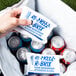 A hand holding a white package of Polar Tech Re-Freez-R-Brix foam freeze packs.