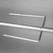 An Optimal Automatics aluminum skewer with built-in fork on one end.