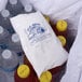 A yellow bag of Polar Tech Ice Brix with water bottles inside.