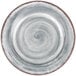 A close up of a white Carlisle Mingle melamine plate with gray swirls.