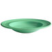 a green bowl with a swirl design