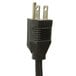 A close up of a black power cord with two plugs on it.