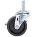 A close-up of a 3 5/8" black and metal swivel stem caster wheel with a bolt.