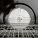 A close-up of a metal rack inside a Blodgett ZEPHAIRE-100-G convection oven.