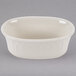 A white bowl with a curved edge.