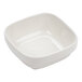 A white square Tuxton Healthcare china bowl.