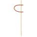 A Tablecraft bamboo pick with a string tied around the tip.
