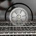 A close-up of a Blodgett metal rack inside a convection oven.