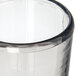 A Carlisle Tritan plastic juice glass with a smoke color.