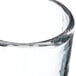 A Carlisle Mingle Tritan plastic juice glass with a handle.